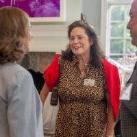 faculty standing and chatting